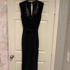 Black Sleeveless Jumpsuit with V Neck & Embellished Front